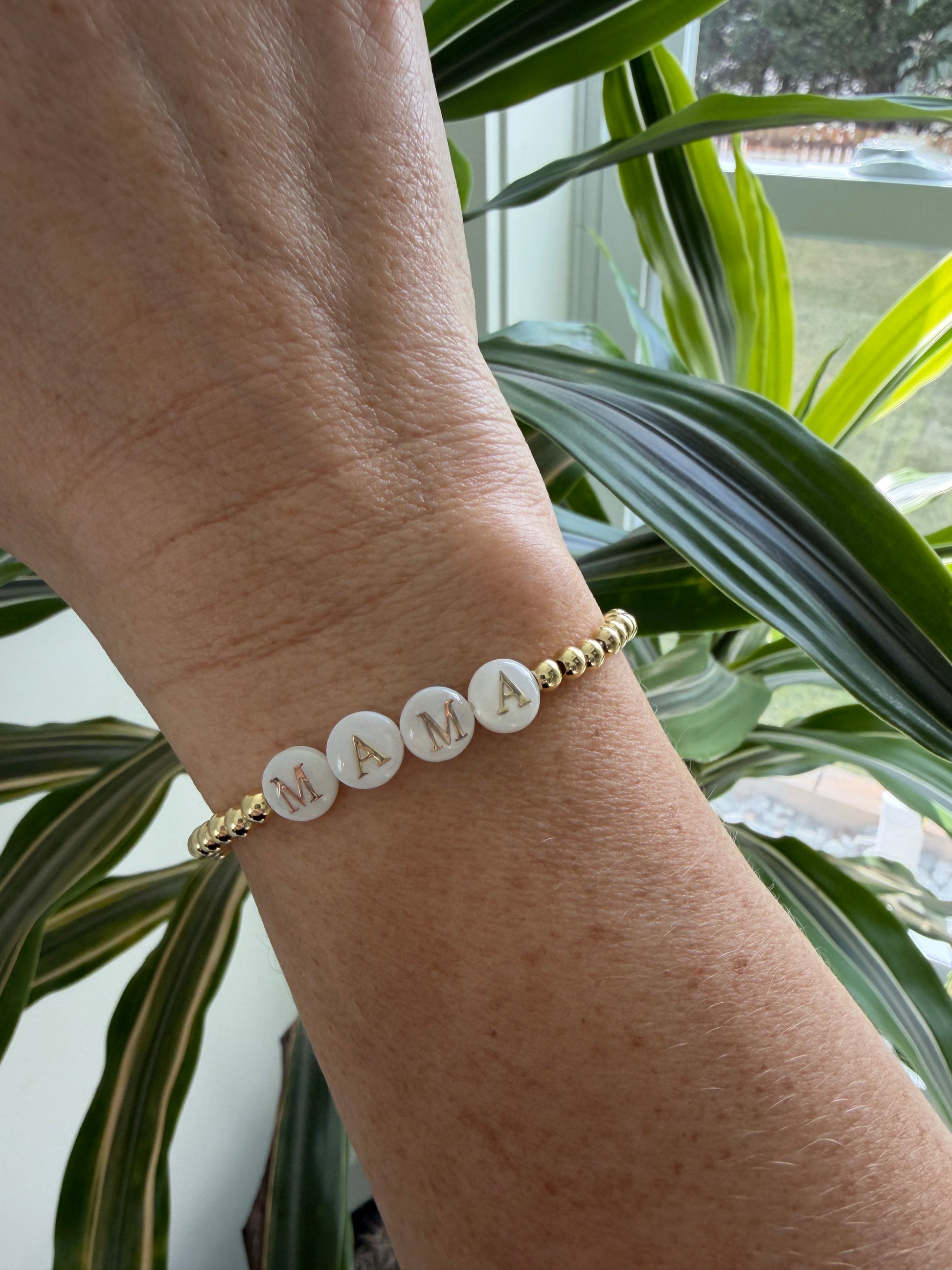 18k Gold-filled mama bracelet stacked with minimalist gold bracelets
