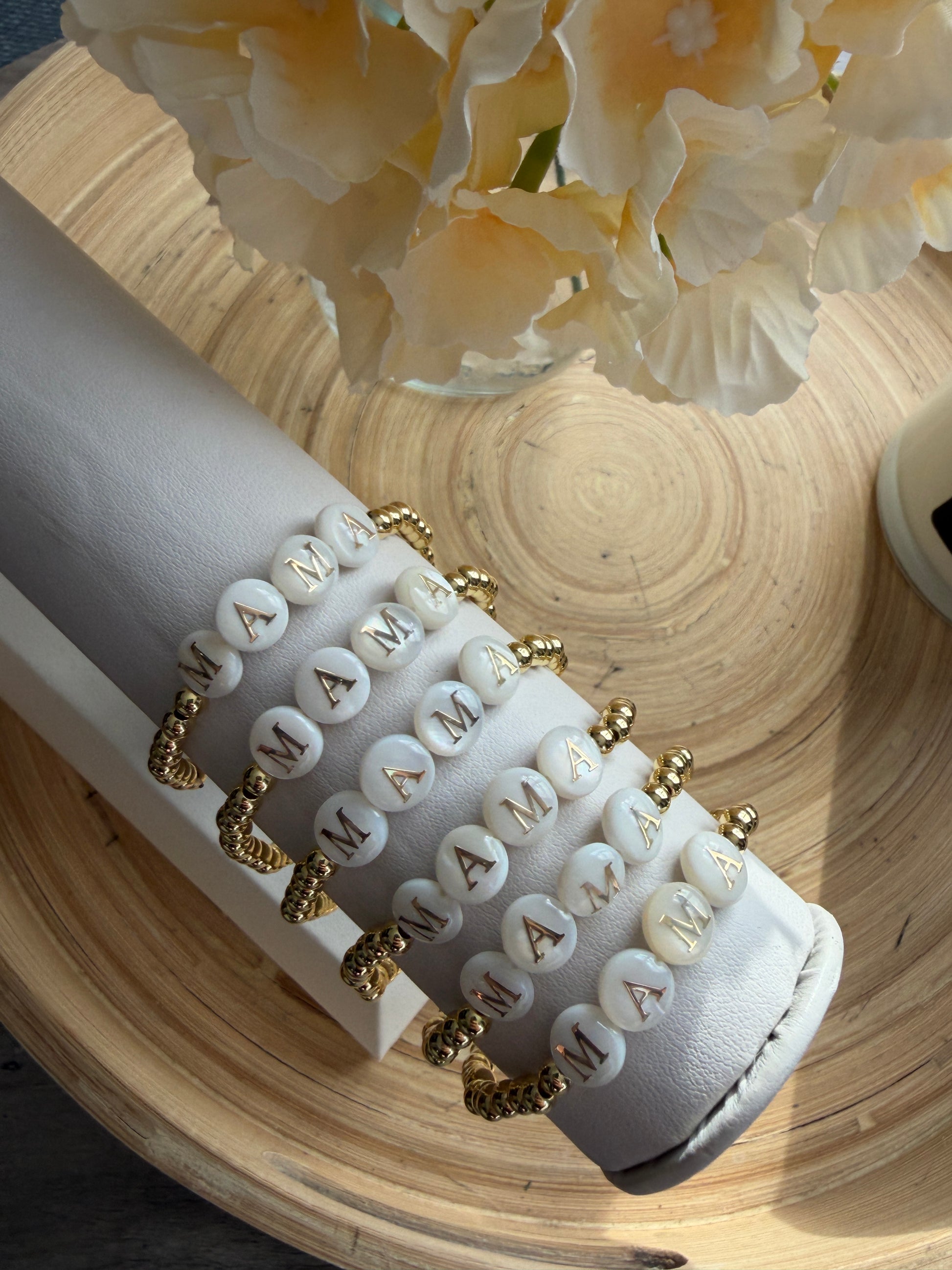 18k Gold-filled mama bracelet stacked with minimalist gold bracelets