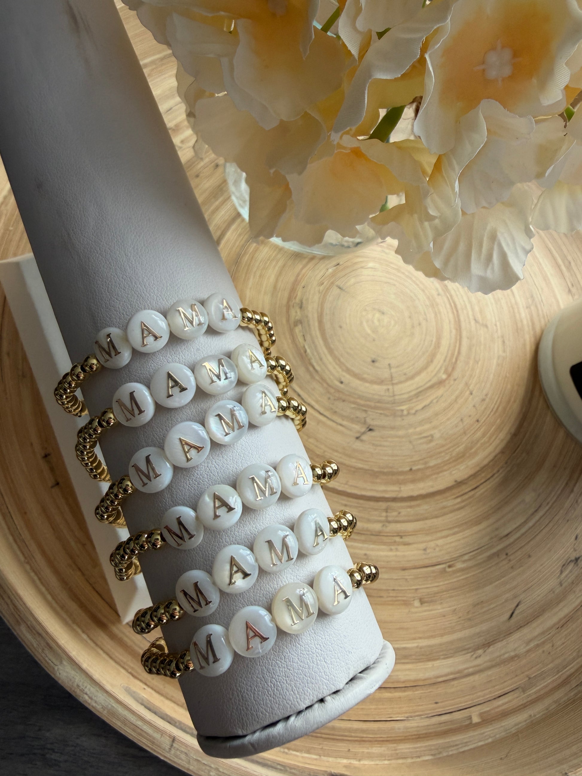 18k Gold-filled mama bracelet stacked with minimalist gold bracelets