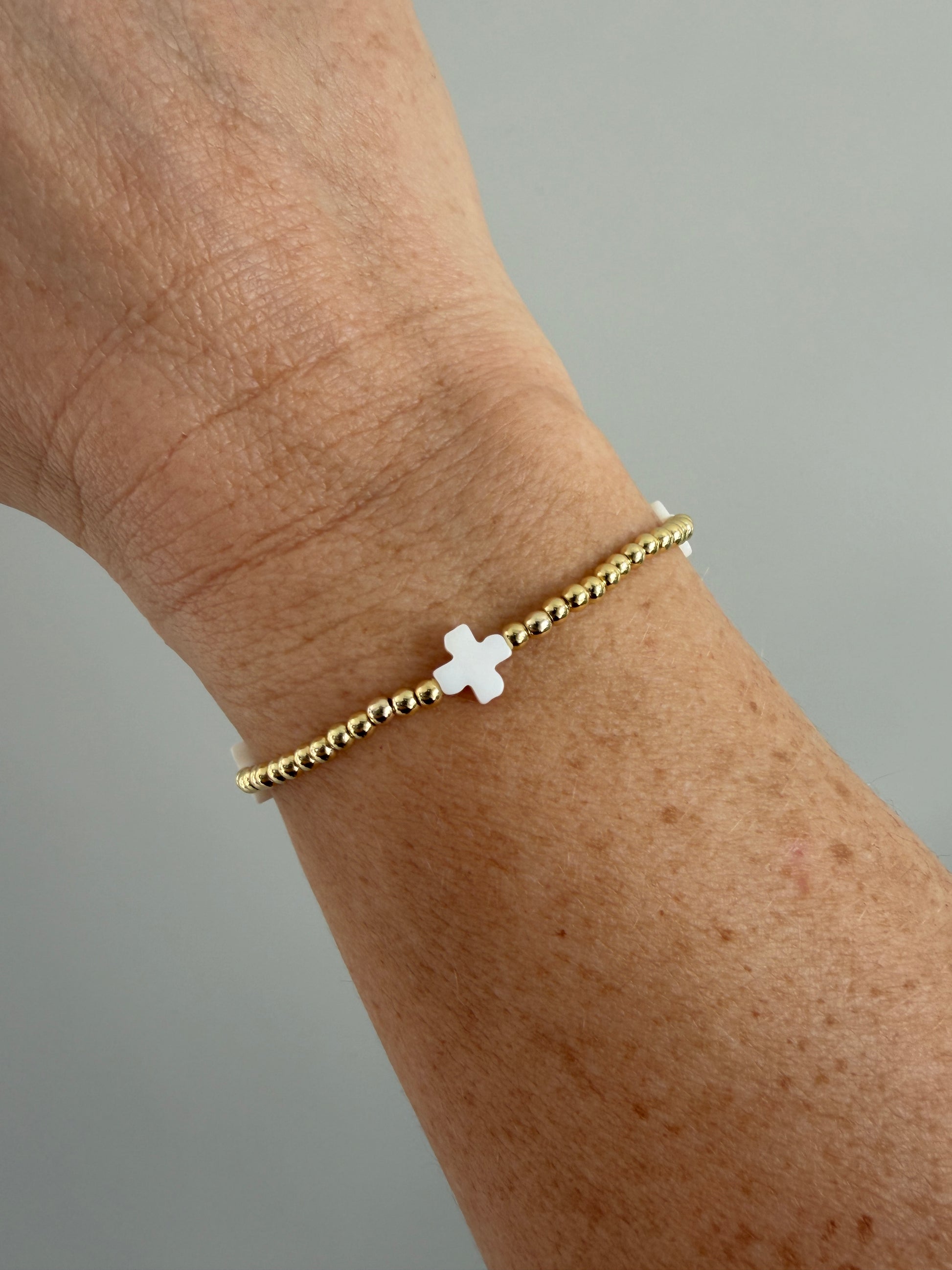 18k gold-filled beaded bracelet with small white cross designs, handmade faith jewelry